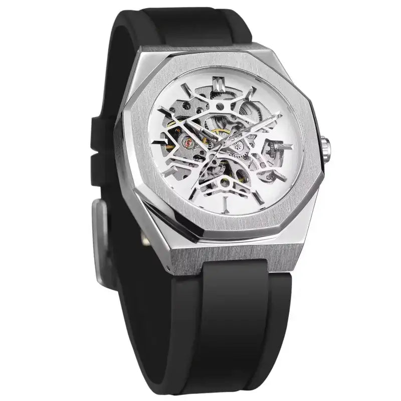 Watch with black strap and silver skeletonized face on white background