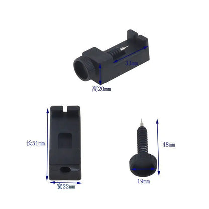 Black plastic component with measurements on a white background