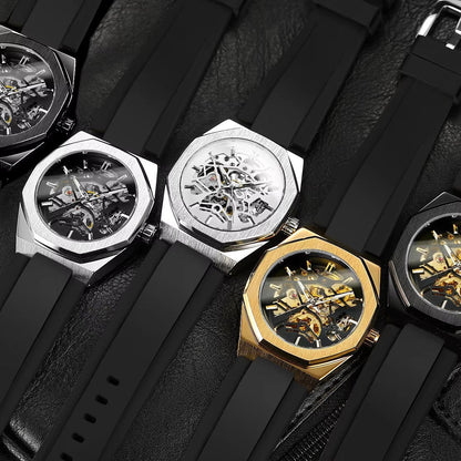 Five watches with different colored cases on black straps