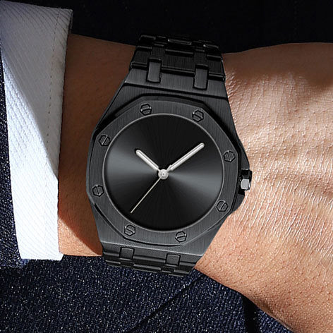 Black watch on a wrist with a dark background