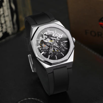 Luxury watch with black strap and transparent face on a dark background