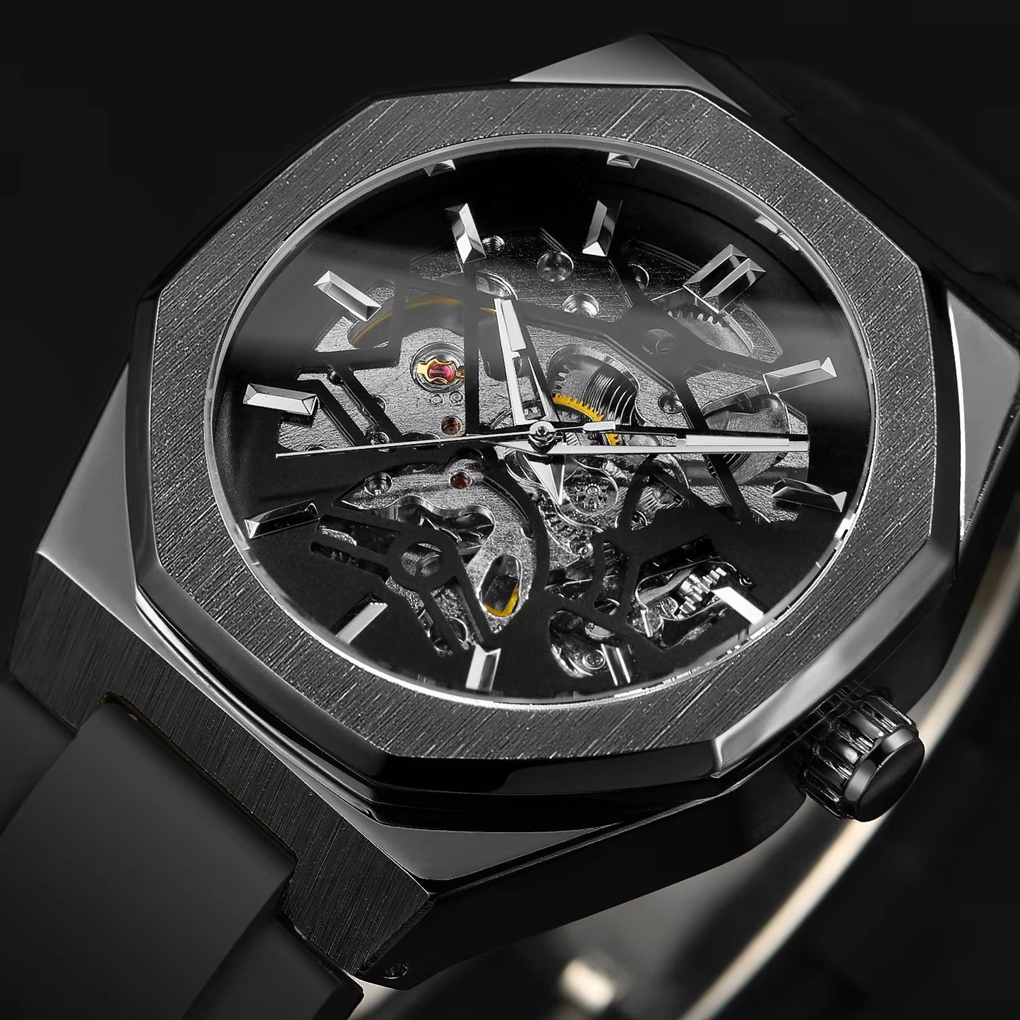 Sleek black wristwatch with a transparent face, revealing intricate mechanical components.