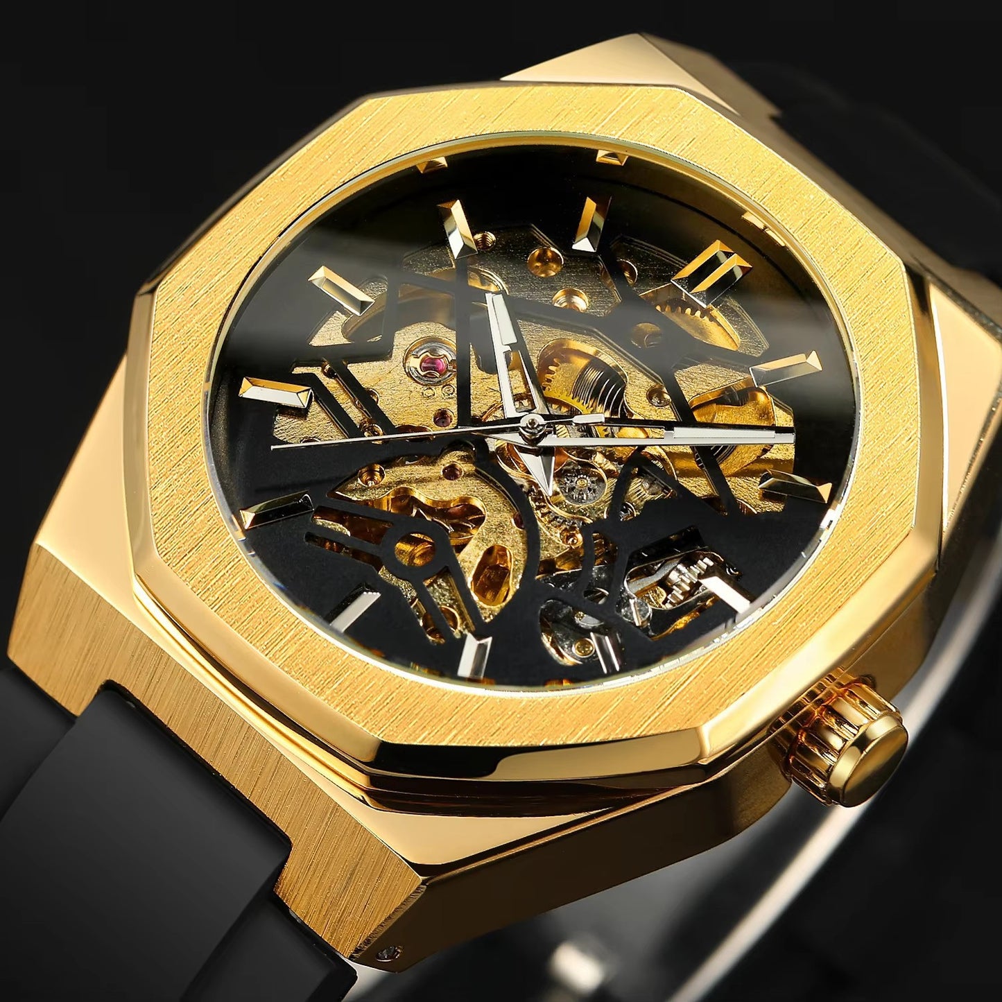 Gold skeleton watch with black face on a dark background